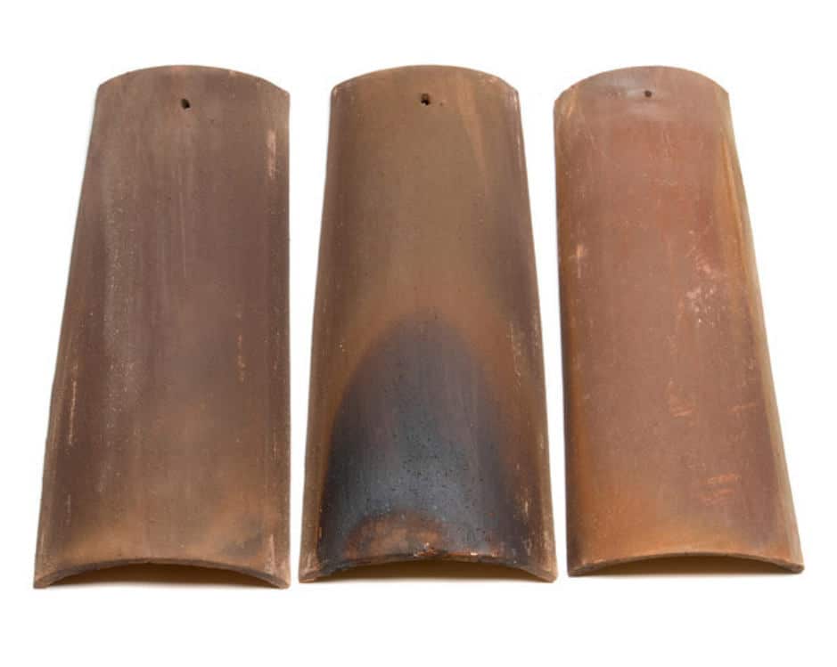 3 clay roof tiles showing the color blend and weathered finish of Tobacco Blend