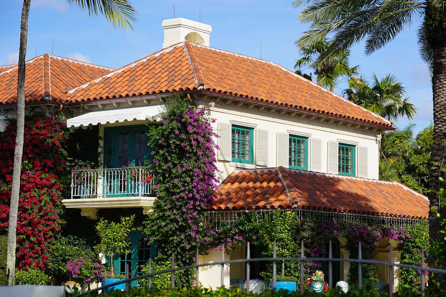 Custom blend of Verea Mission Pan And Cover House with Flowers In The Garden.