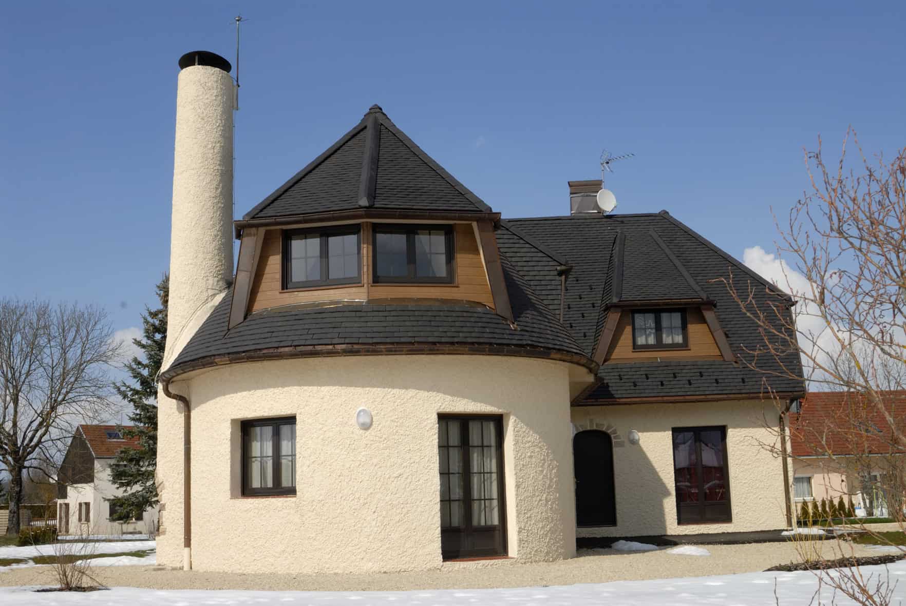 Interesting house in Slate blend French clay roof tiles