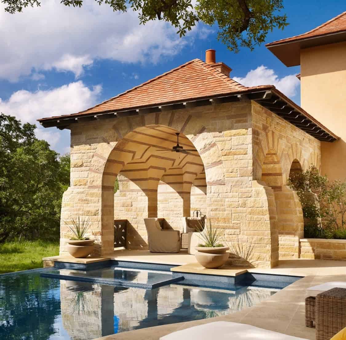 The handmade surface weathered texture of Essex tiles bring depth and authenticity to this sloped roofline. Color is Limestone