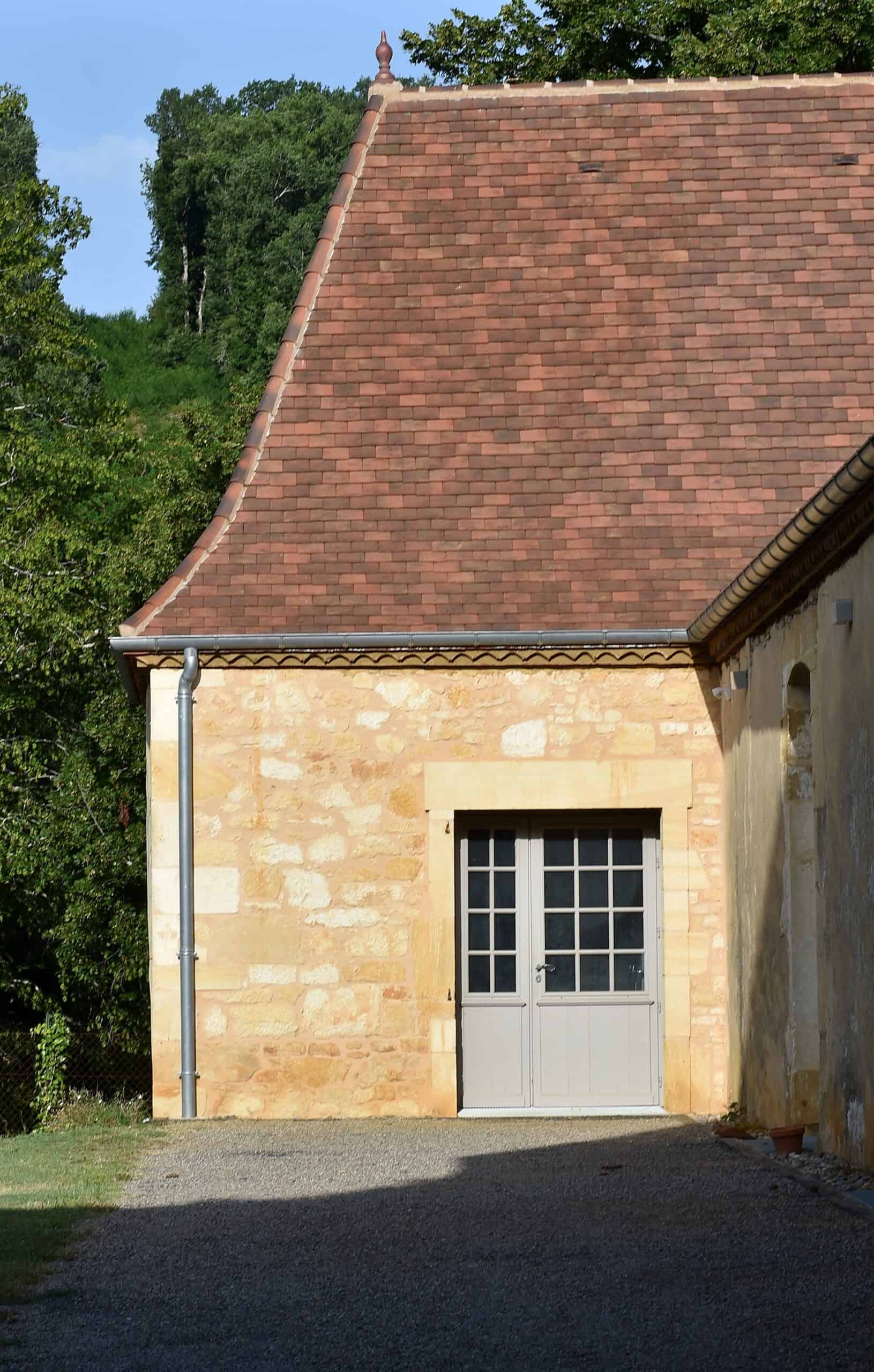 Side Elevation of Home with Huguenot Gabarre Clay Roof Tiles