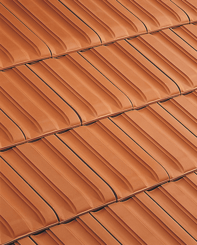 PV13 French interlocking clay roof tile in natural red installed on roof