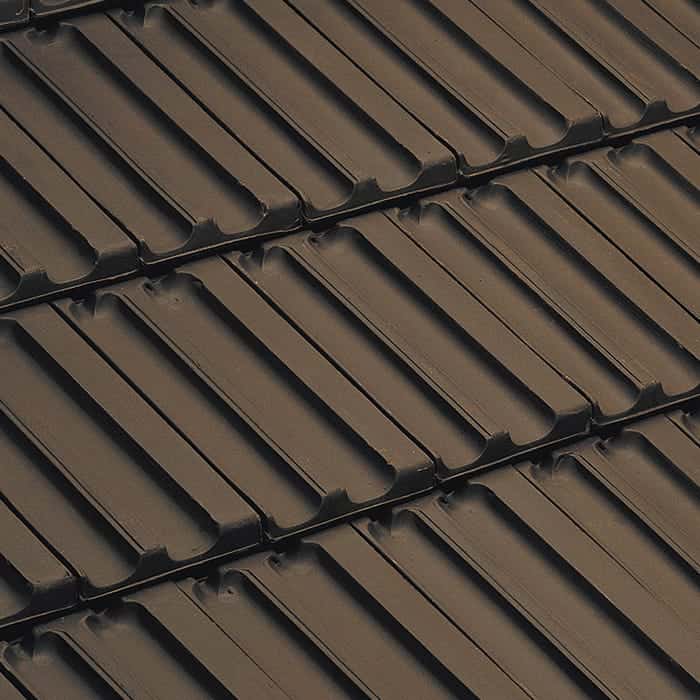 Edilians H14 French clay roof tile in brown, interlocking profile installed on roof
