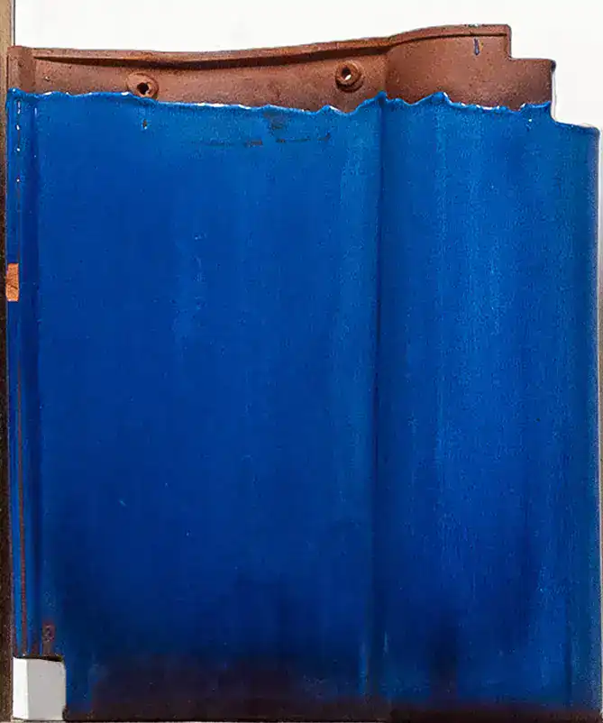 Front of reclaimed clay roof tile used for identification and matching