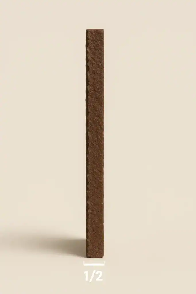 Side profile of reclaimed roof tile showing thickness and curvature